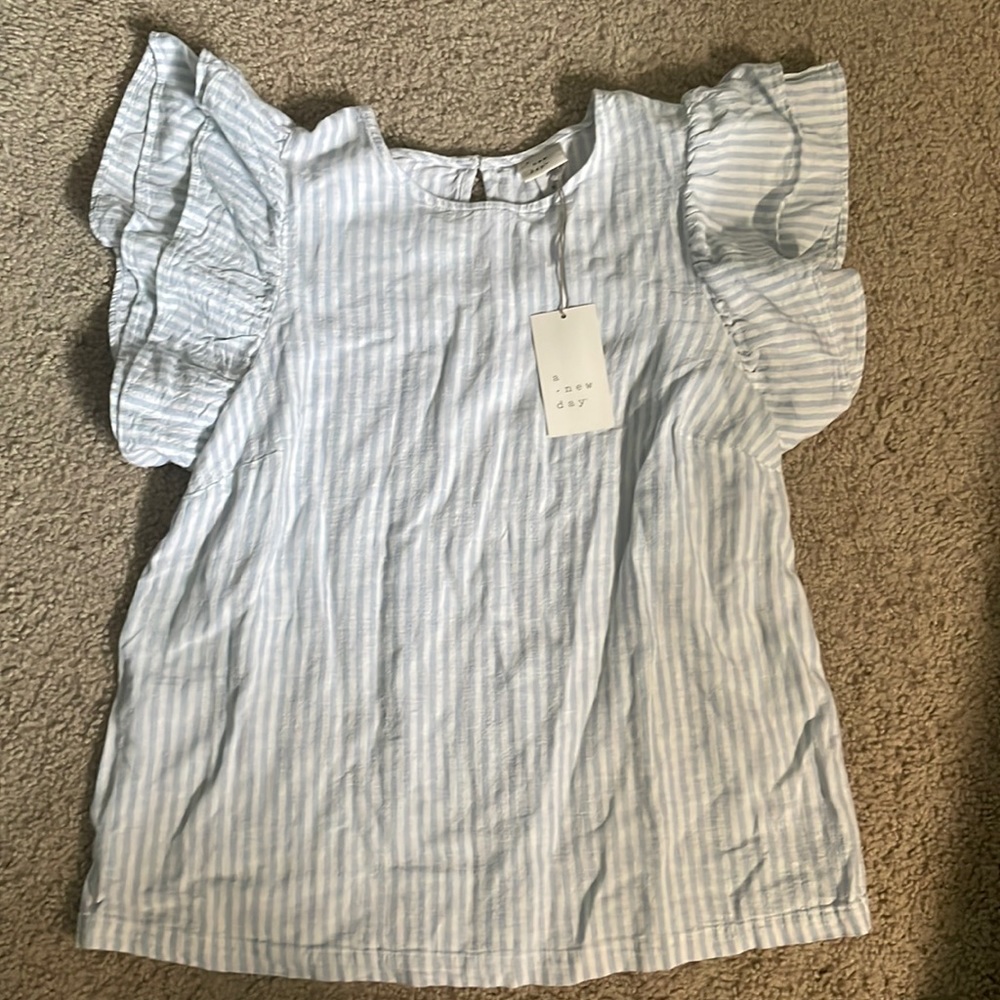 A new day strip shirt.